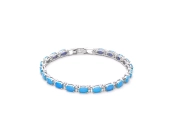 Srebrna bransoletka Schubert z niebieskim opalem i cyrkoniami – elegancja i kolor