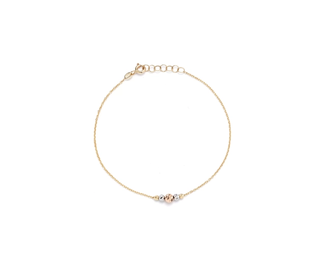 Złota bransoletka z trzema kuleczkami, subtelna elegancja, żółte, białe i różowe złoto, delikatny design.