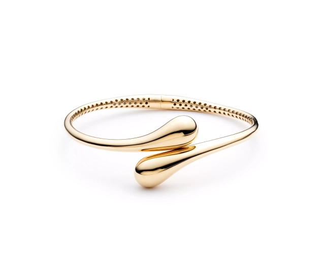 Złota sztywna bransoletka z kroplami