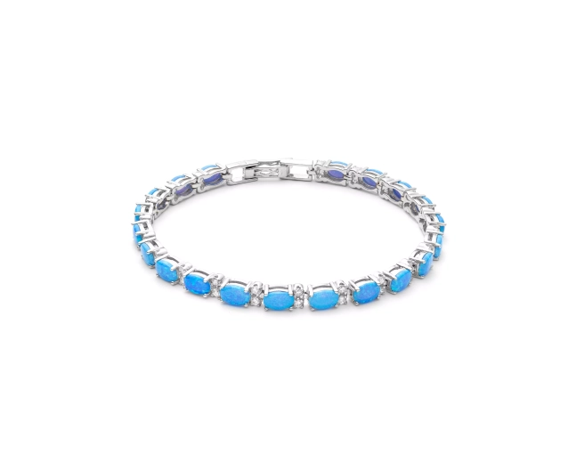 Srebrna bransoletka Schubert z niebieskim opalem i cyrkoniami – elegancja i kolor