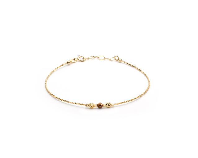 Bransoletka złota sztywna dwukolorowa z koralikami z żółtego i czerwonego złota