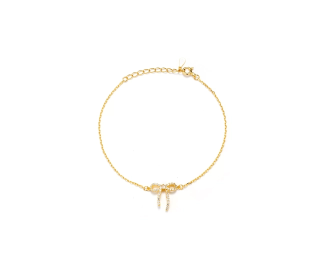 Bransoletka pozłacana z cyrkoniową kokardką