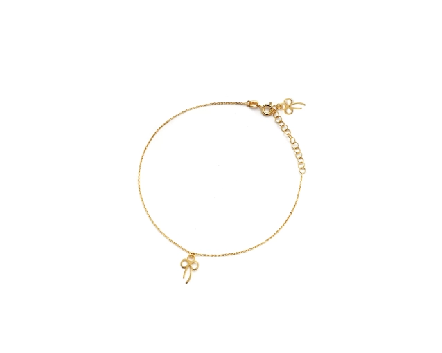 Bransoletka pozłacana na nogę z kokardką