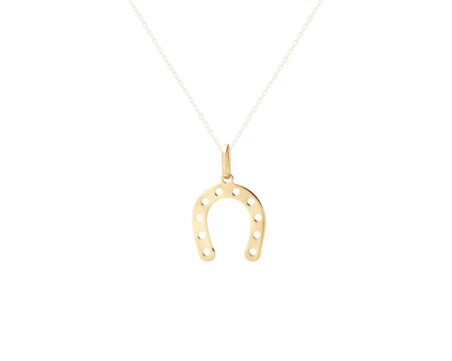 Złota zawieszka w kształcie podkowy, symbol szczęścia, elegancja, złoto.